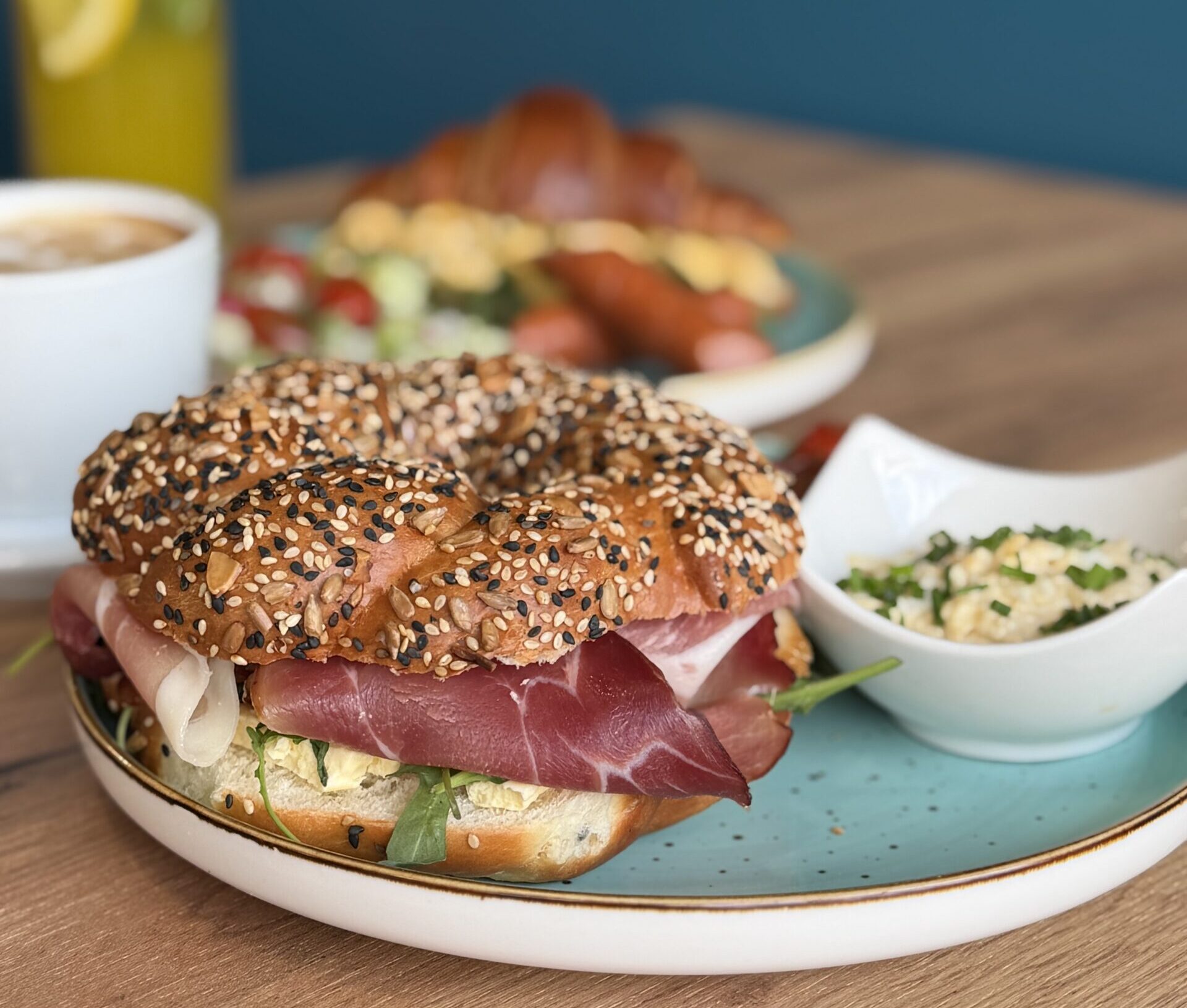 Close-up of pancakes and fresh strawberries on wooden boards, showcasing a sweet breakfast treat.
